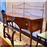 F03. Antique sideboard with brass rail. 35”h x 80”w x 28”d (height of brass rail 58”) 